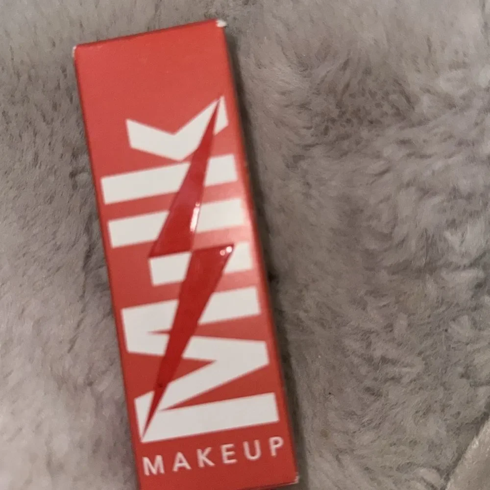 NIB 25.00 Electric Glossy Lip Plumper hydrating lip plumper Wired